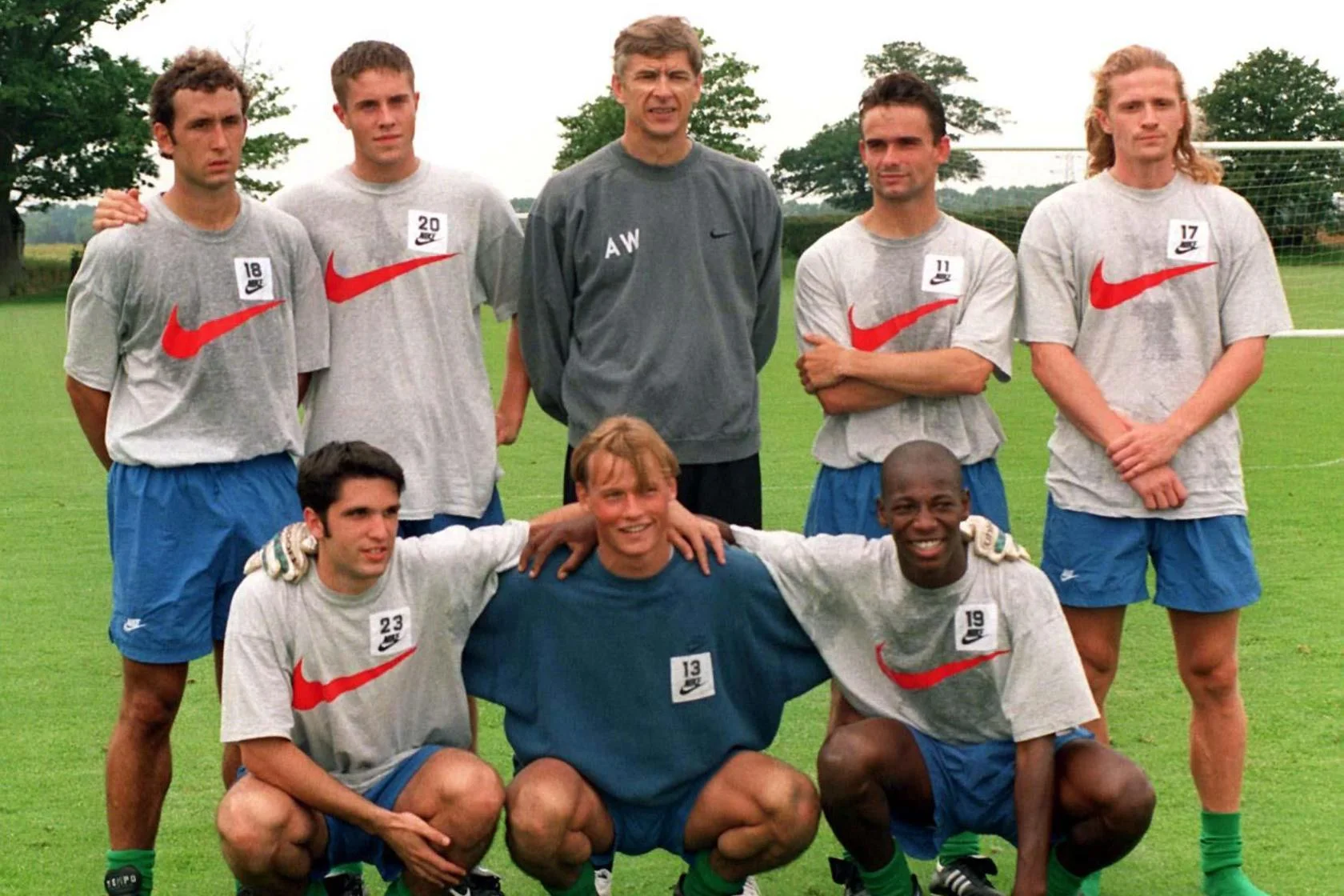 Arsene Wenger with his new signings in 1997.
