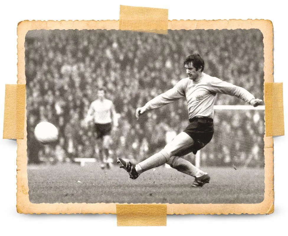 Black and white action shot of Ian Butler scoring Hull City's second penalty in the Hull City v Manchester United Watney Cup match in 1970